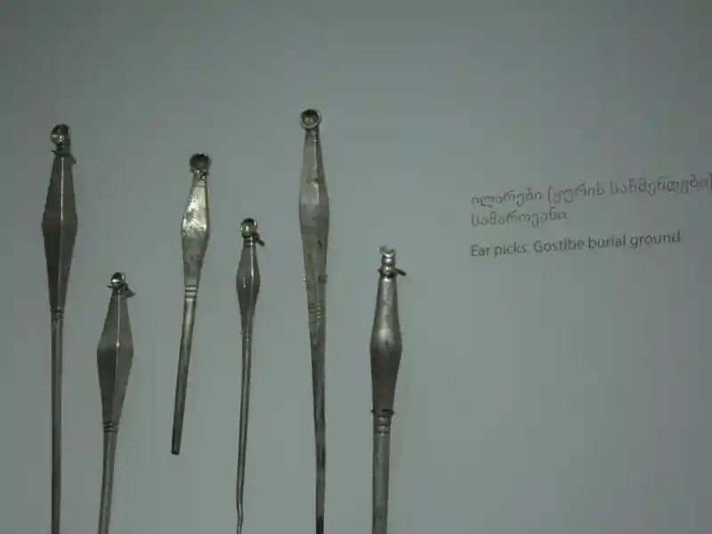 Metal ear picks with a shape resembling a diamond